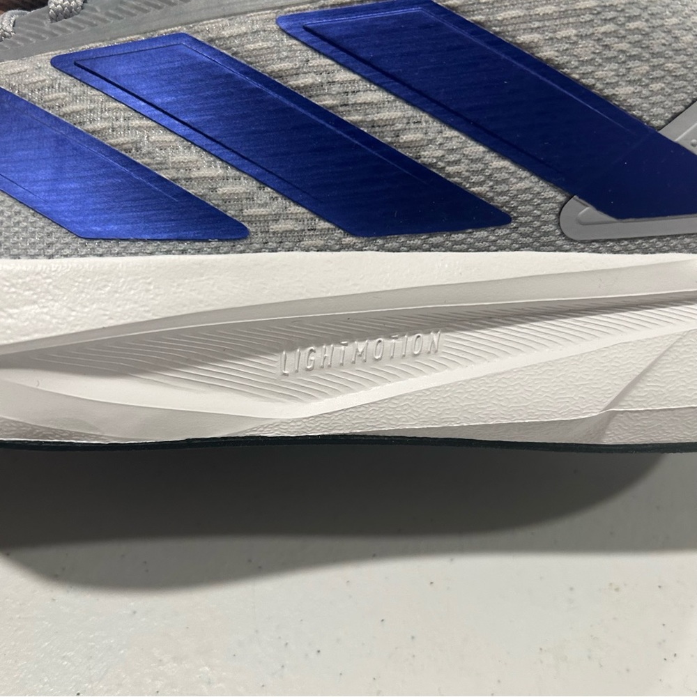 adidas Men's Duramo SL 2 Running Sneaker, Halo Silver/Lucid Blue/Grey, 6.5 - Picture 9 of 10